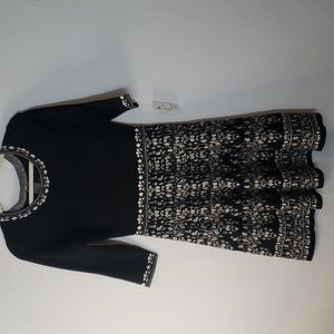 Taylor fit and flare floral sweater dress. Size medium.